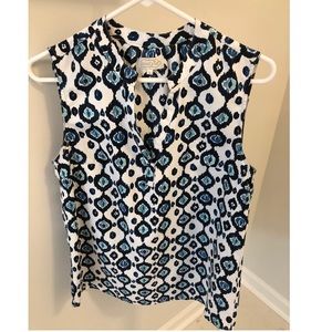 Sleeveless white and blue tank top